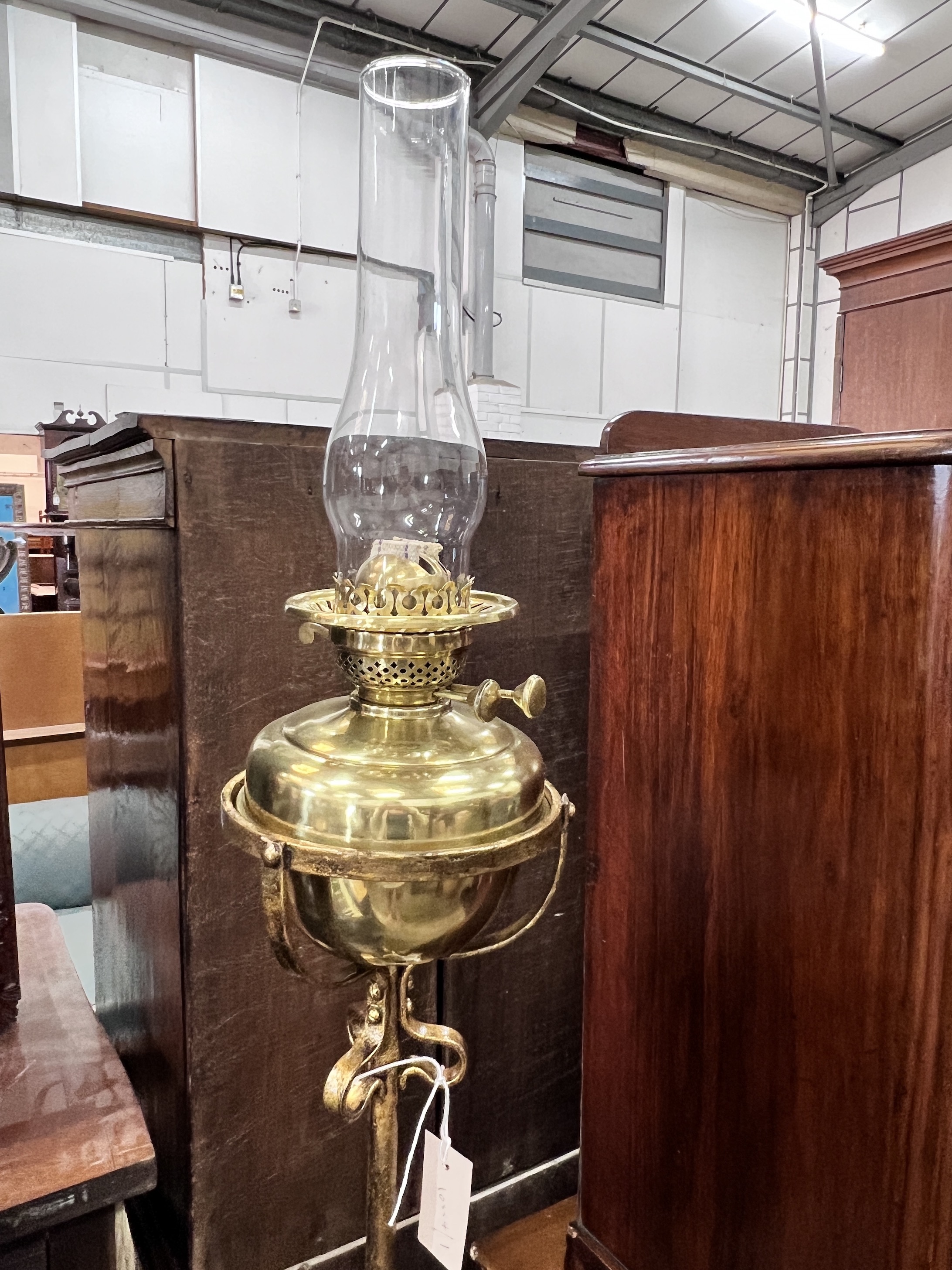 A late Victorian painted wrought iron telescopic oil lamp standard